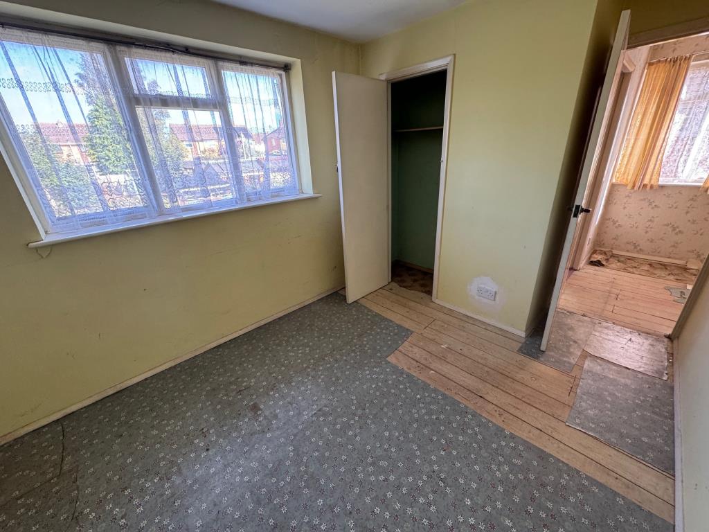 Lot: 12 - THREE-BEDROOM HOUSE FOR IMPROVEMENT WITH GARAGE EN-BLOC - Bedroom 2